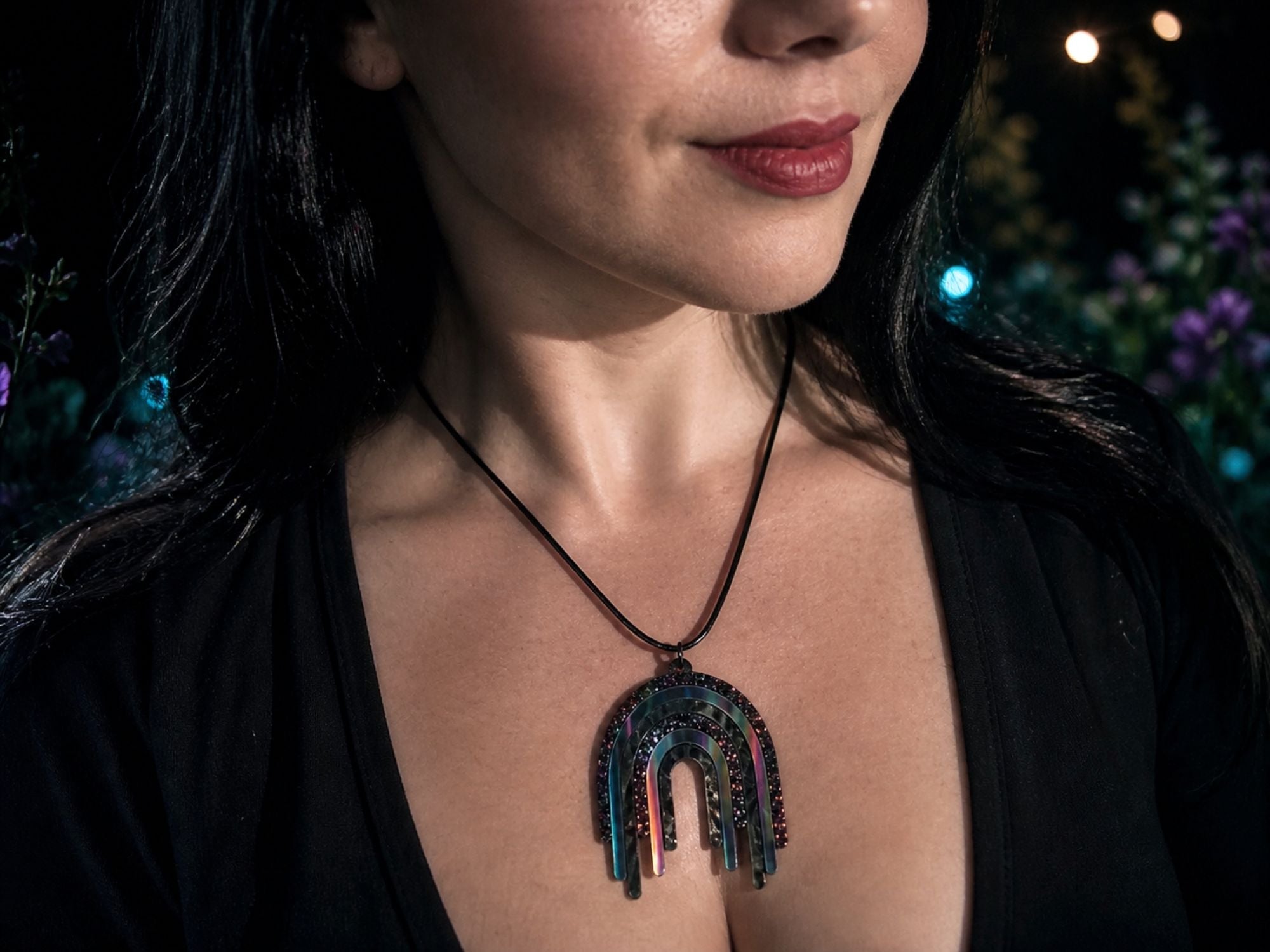 Model wearing Full Spectrum Rebel Drip Pendant in Black Rainbow colorway