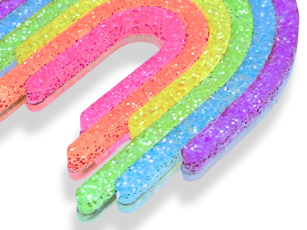 Close-up detail of Full Spectrum Rebel Rainbow Rave glitter acrylic layers and frosted translucent finish.