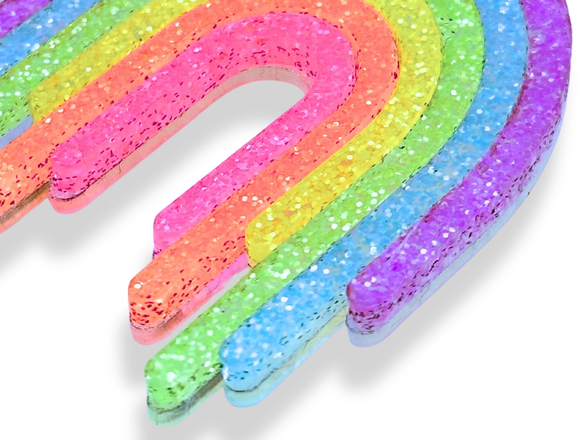 Close-up detail of Full Spectrum Rebel Rainbow Rave glitter acrylic layers and frosted translucent finish.