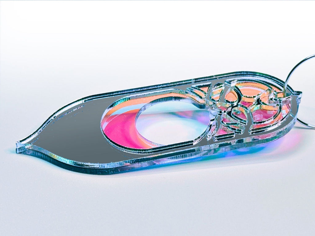Iridescent acrylic Galadriel statement earrings with silver mirror detailing on soft gradient background