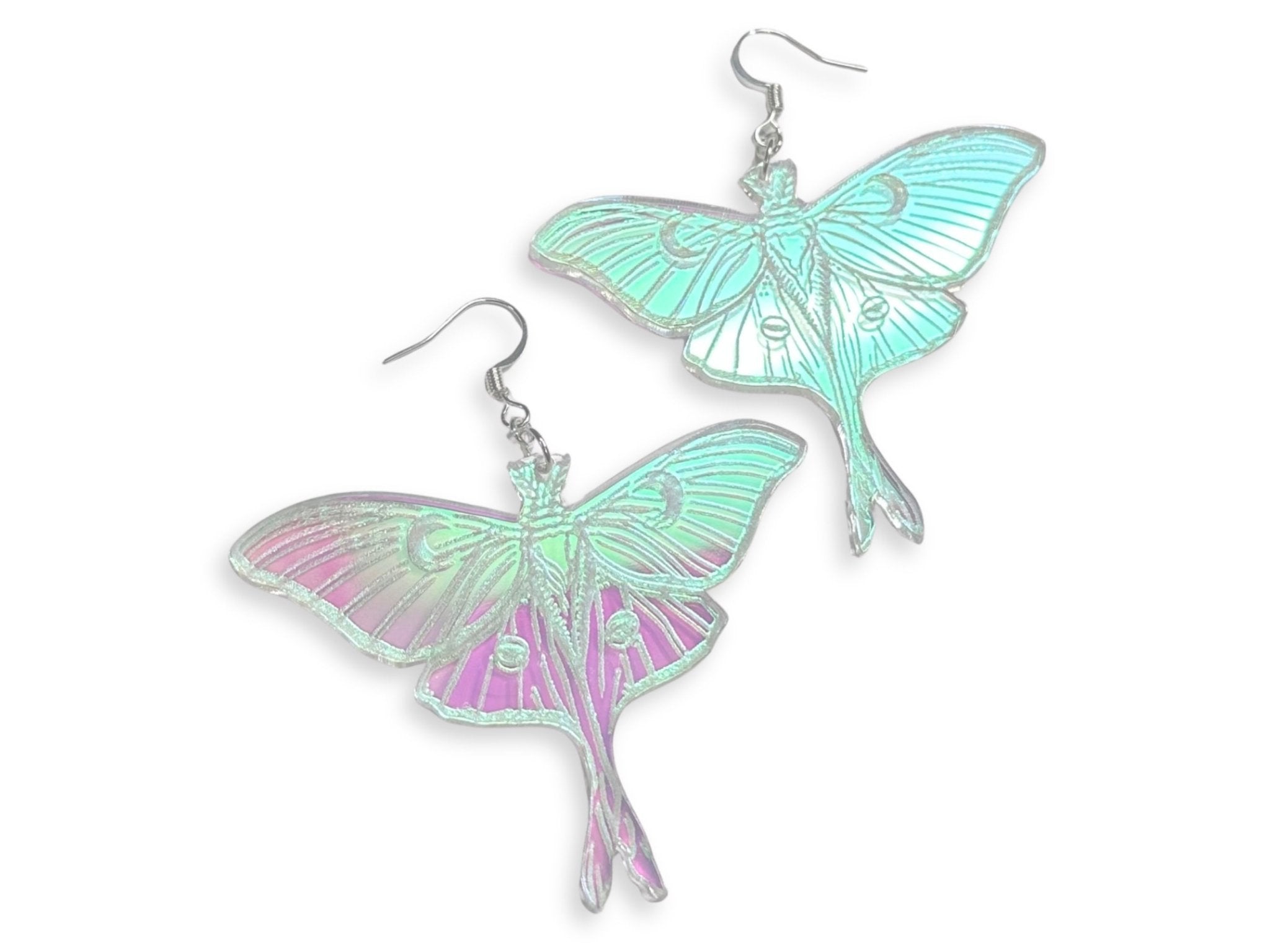 Iridescent luna moth statement earrings on white background