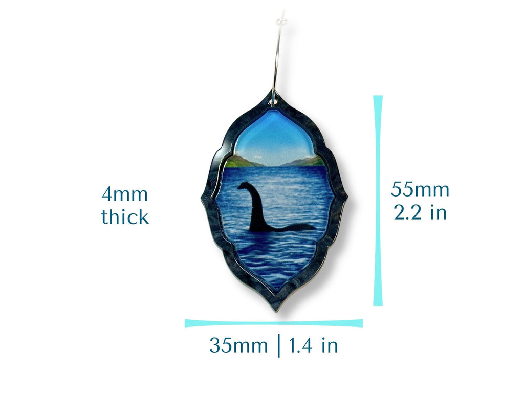 Loch Ness monster earring size chart showing 55mm height, 35mm width, and 4mm thickness.