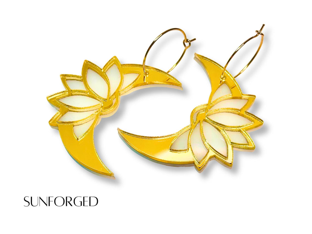 Sunforged lotus moon earrings with gold crescent moons on white background
