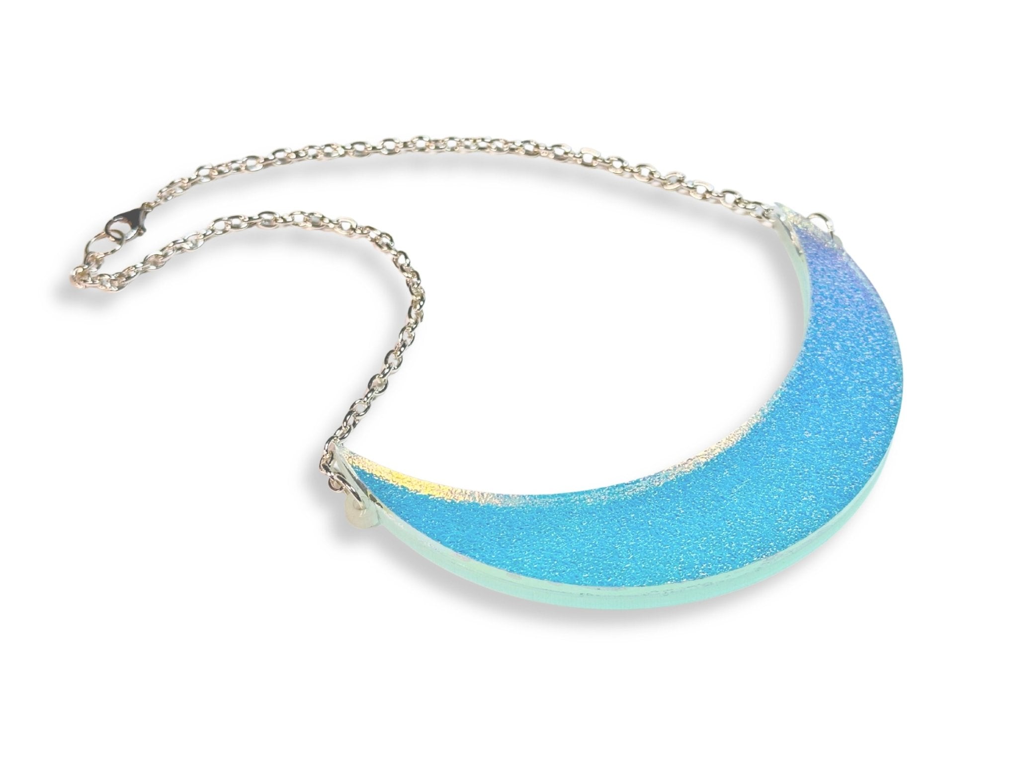 Textured iridescent crescent moon collar necklace with blue color shift