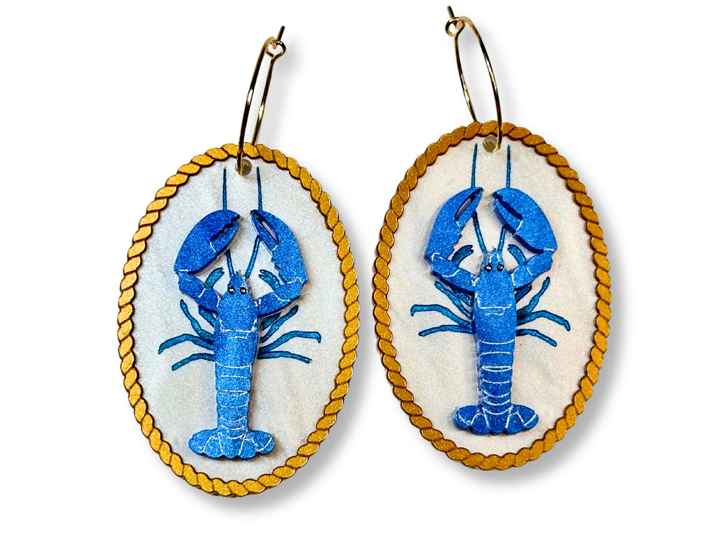 Blue lobster earrings with raised engraved acrylic artwork and gold rope border