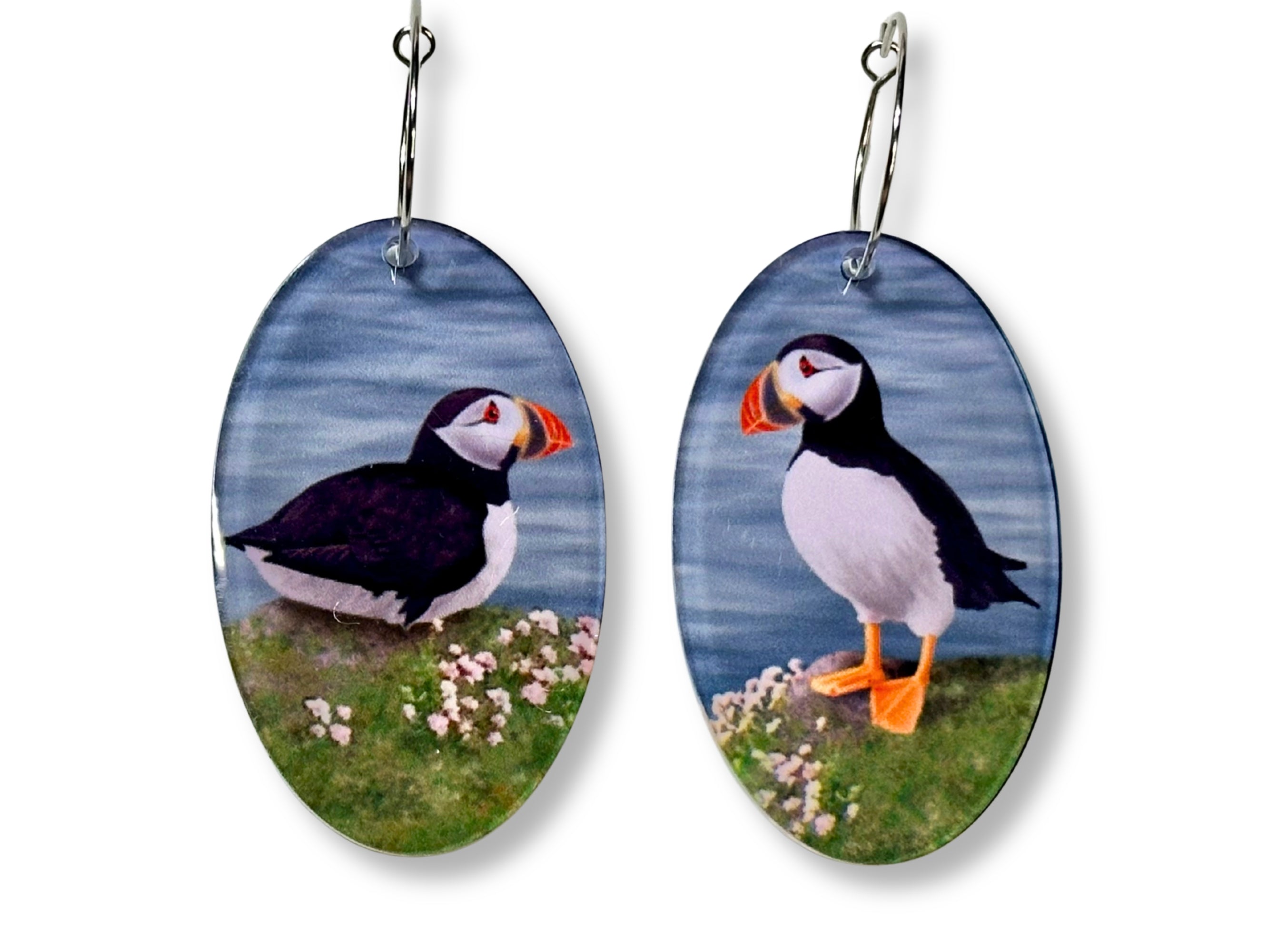 Puffin earrings featuring original Painted Raina bird artwork on oval drops