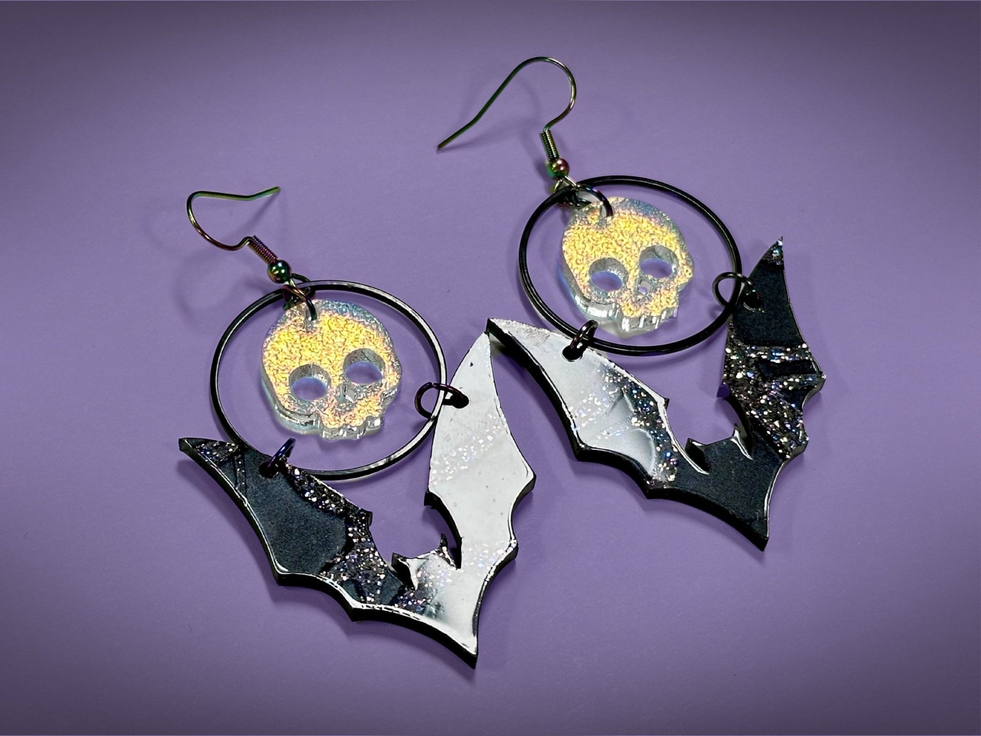 Skull and Bat Earrings | Sparkling Iridescent Halloween Novelty Dangles ! - Painted Raina