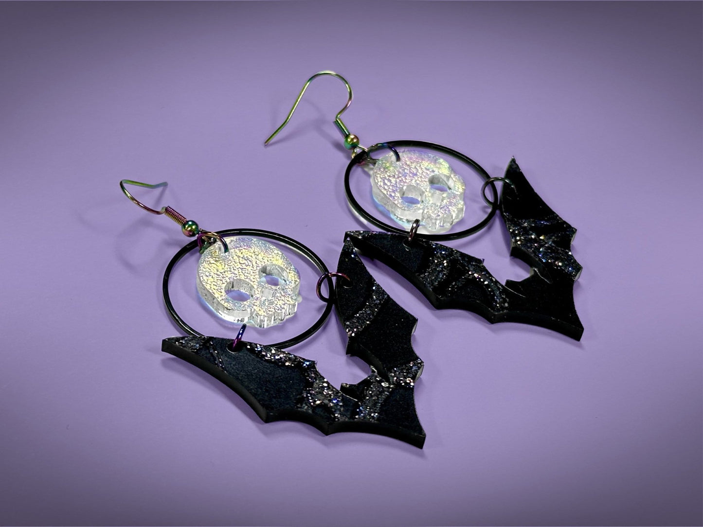 Skull and Bat Earrings | Sparkling Iridescent Halloween Novelty Dangles ! - Painted Raina