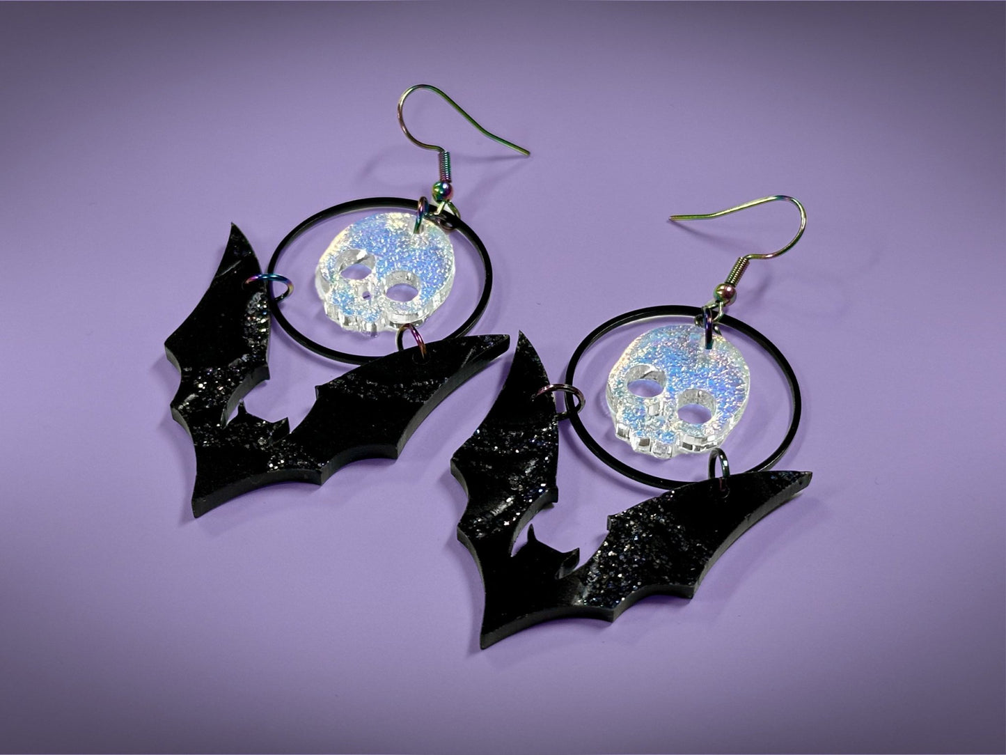 Skull and Bat Earrings | Sparkling Iridescent Halloween Novelty Dangles ! - Painted Raina