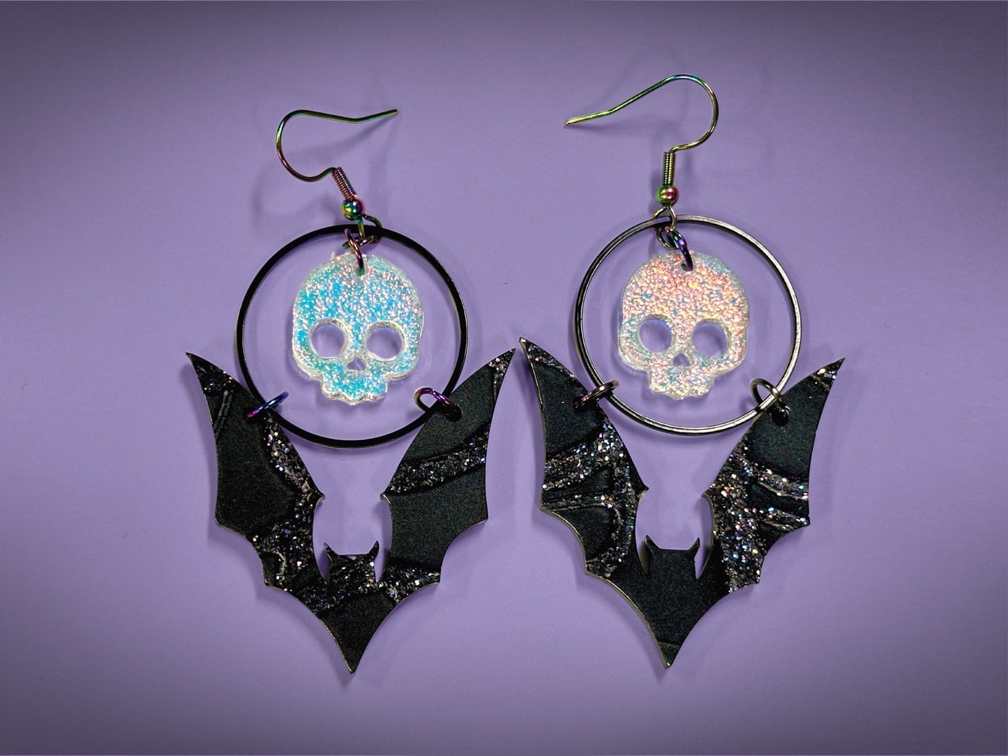 Skull and Bat Earrings | Sparkling Iridescent Halloween Novelty Dangles ! - Painted Raina