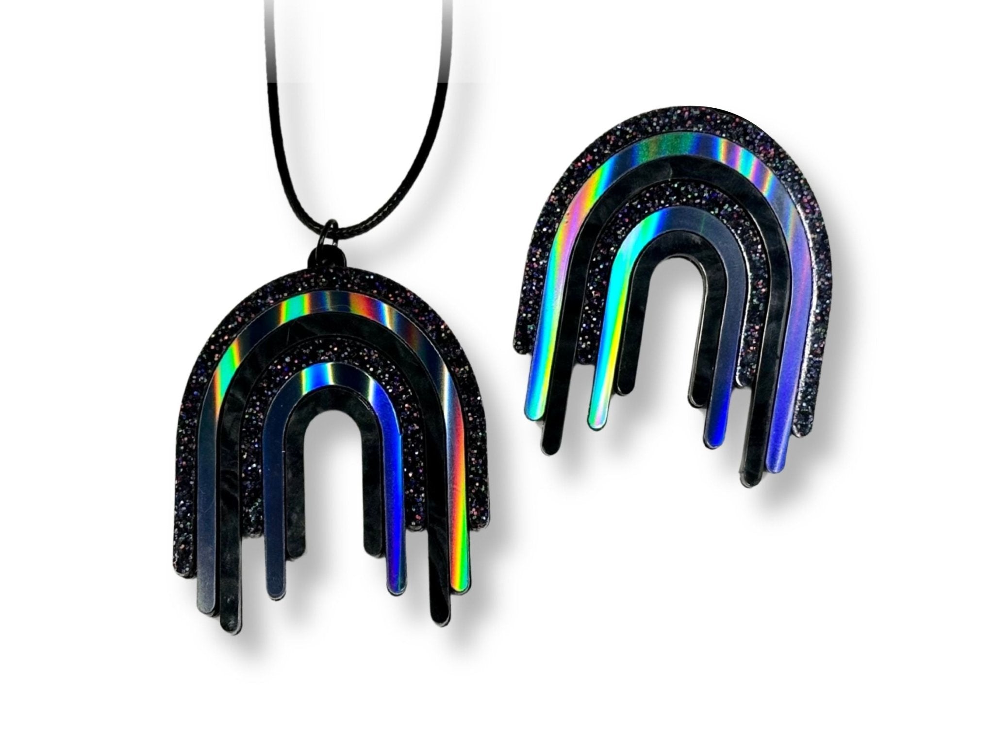 Full Spectrum Rebel Control Set in Black Rainbow featuring matching drip pendant and brooch