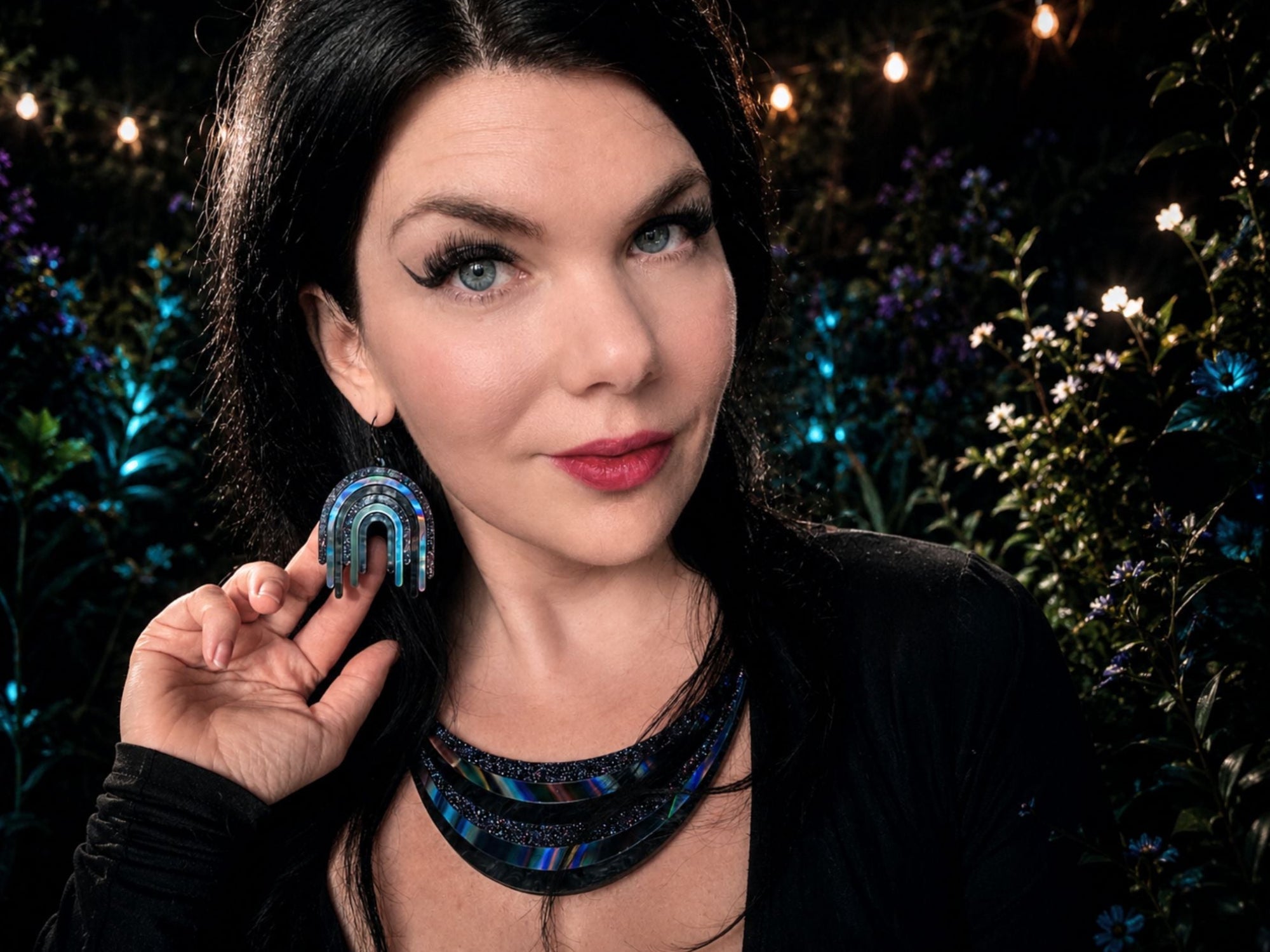 Model wearing Black Rainbow Arc Statement Necklace and matching earrings