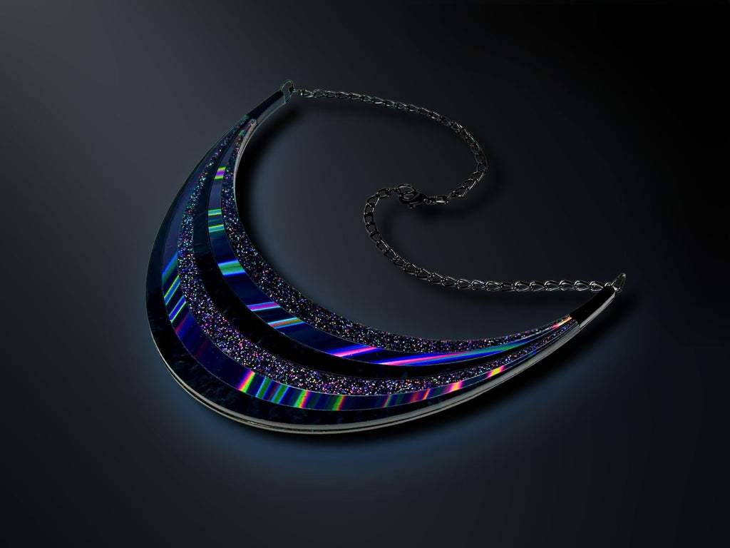 Black Rainbow Arc Statement Necklace photographed on dark background