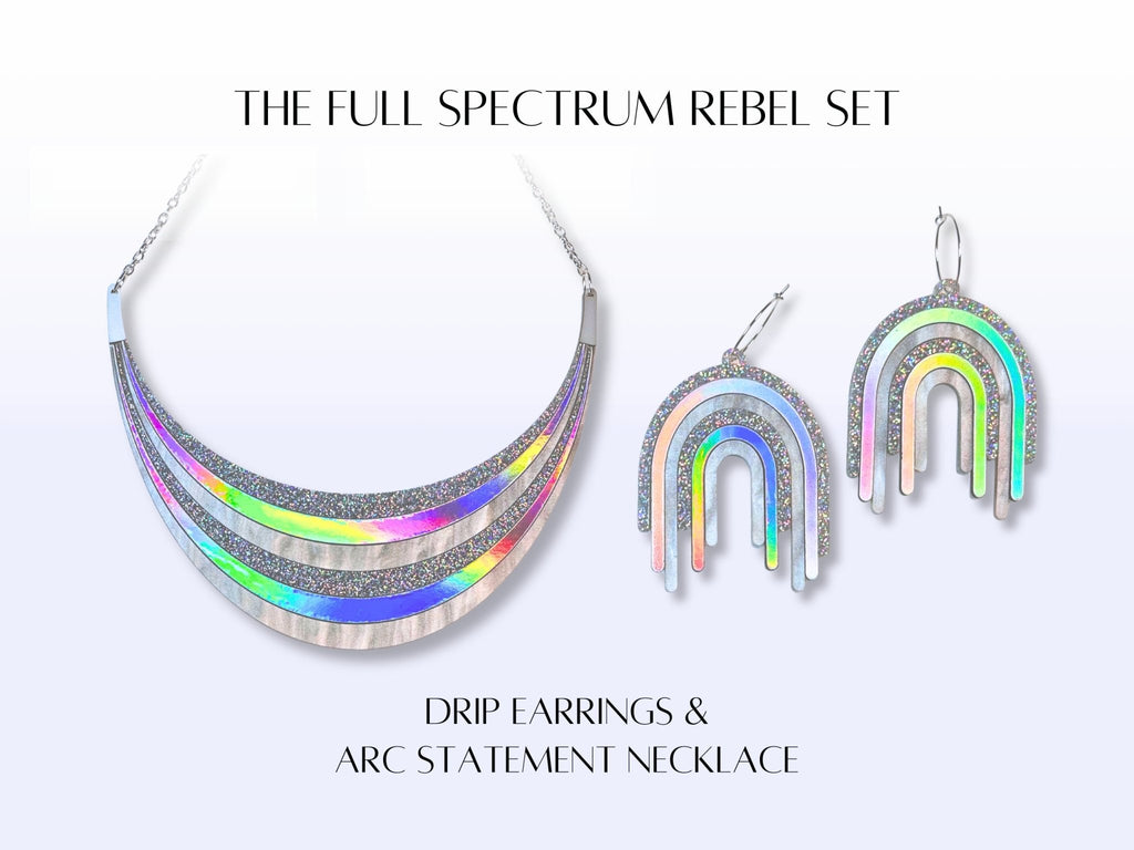 Full Spectrum Rebel Disco Prism jewelry set showing the arc statement necklace and matching drip earrings.