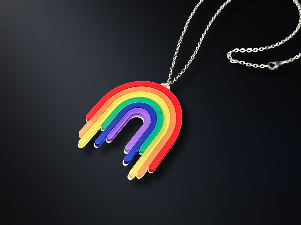 Full Spectrum Rebel Drip Pendant necklace in layered rainbow acrylic
