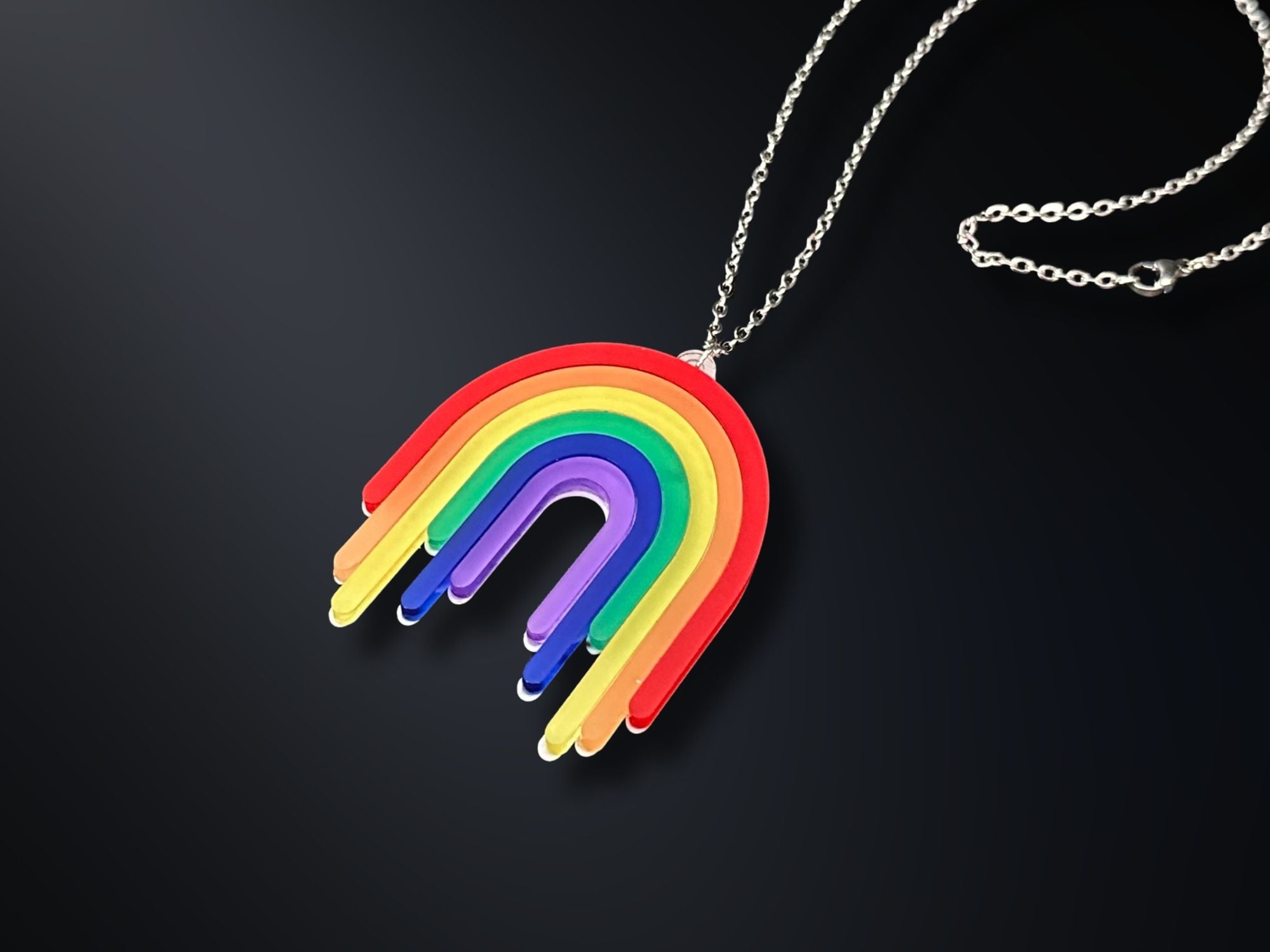 Full Spectrum Rebel Drip Pendant necklace in layered rainbow acrylic