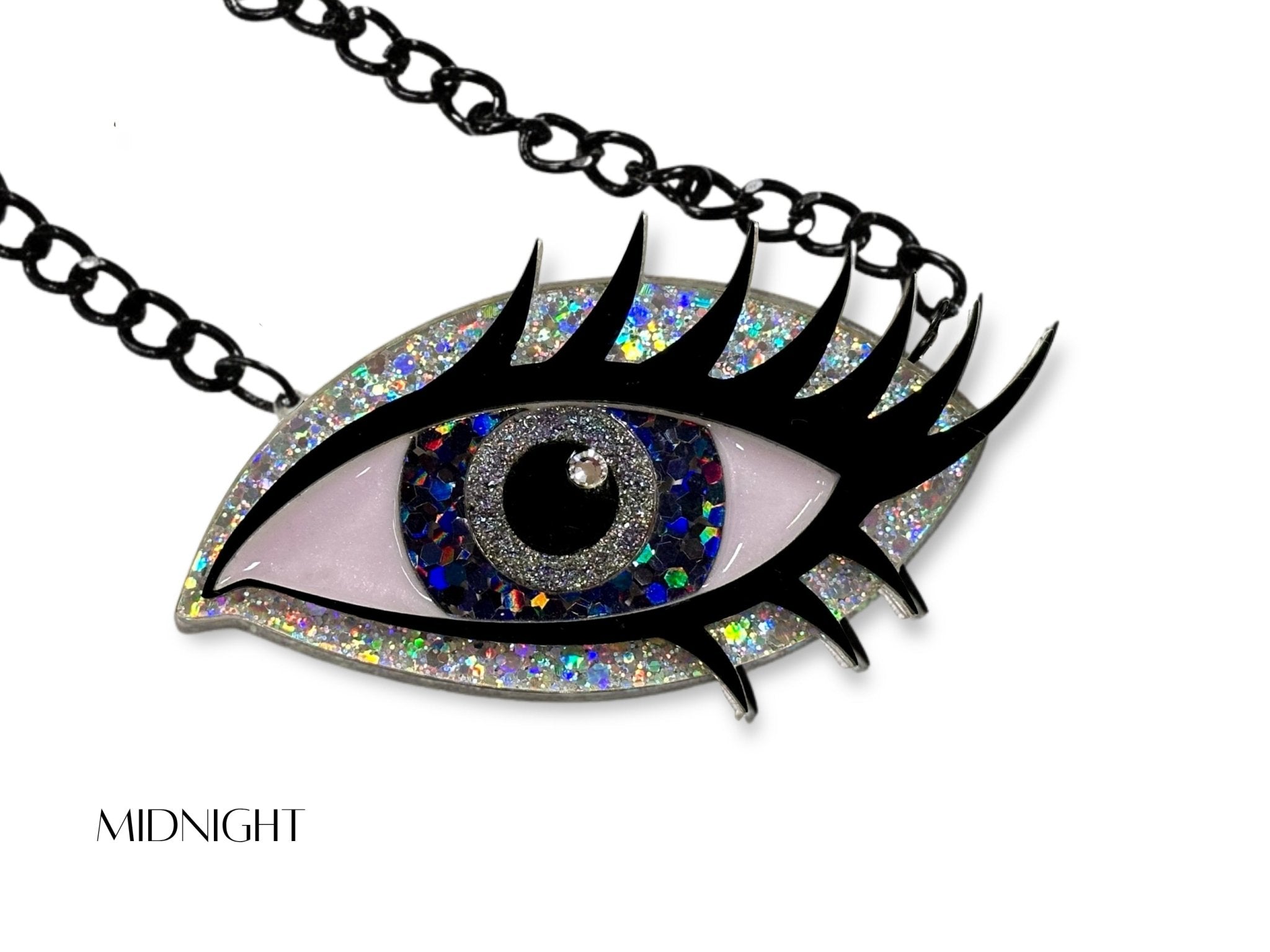 Midnight Siren Eye statement necklace with silver holographic glitter, dark multicolor iris, black lashes, and black chain.