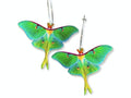 Vibrant green luna moth wing earrings displayed on silver hooks against a white background, featuring vivid lime and turquoise wings with pink edging and long yellow tails.