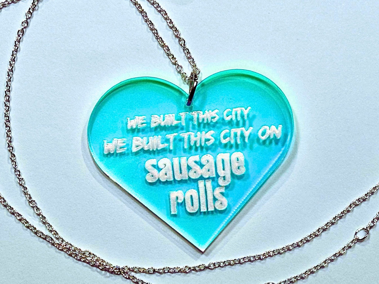 Misheard Lyrics Pendant | We Built This City on Sausage Rolls - Painted Raina